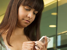Young woman on smartphone 