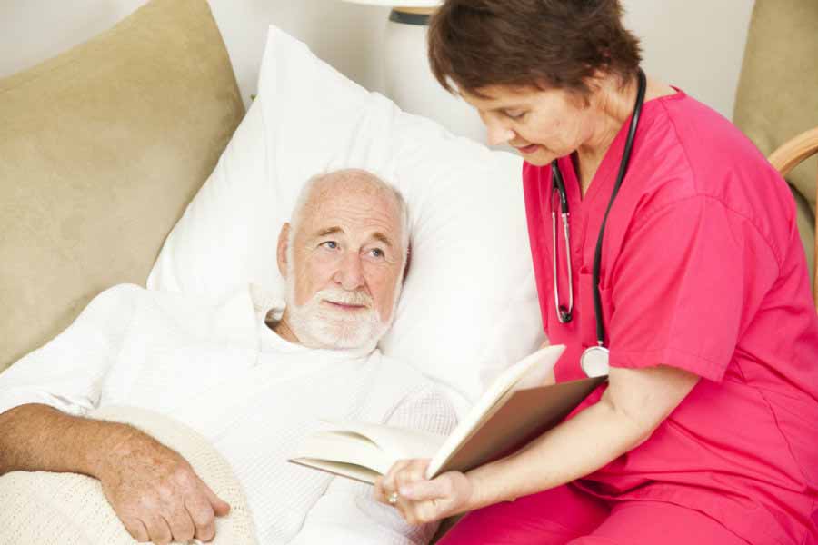 nurse speaking to patient