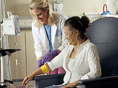 nurse bandages chemotherapy patient