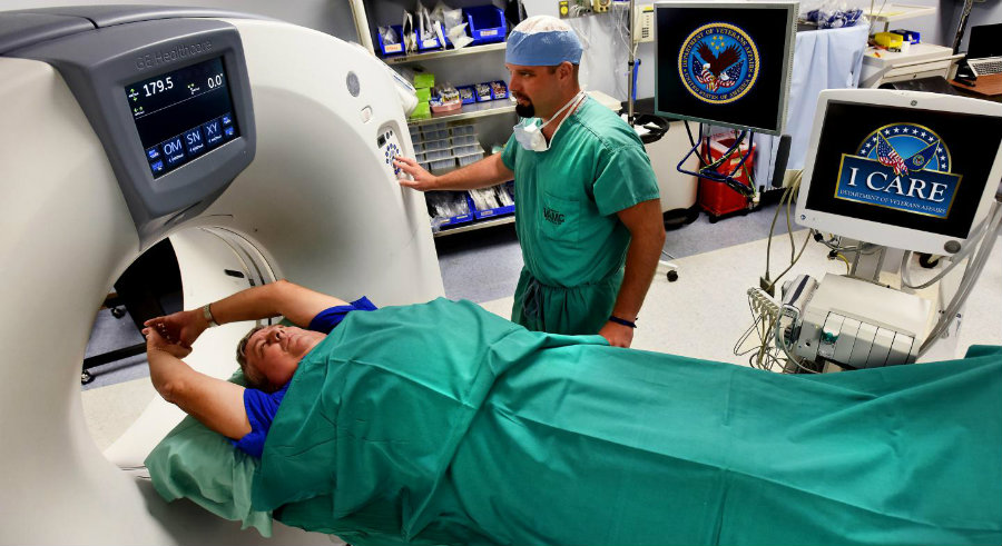A person being screened for lung cancer with a low-dose CT scan.