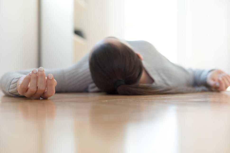 Person lying on the floor