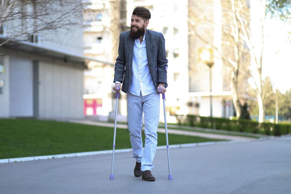 Person walking with canes