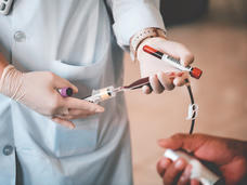 Nurse drawing a patient's blood