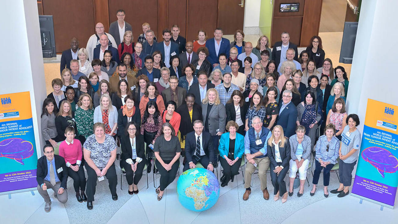 Group photo of providers and patient advocates at a conference