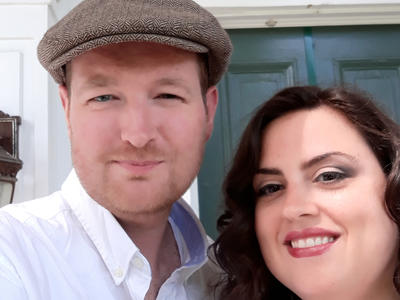 Paul and his wife smiling