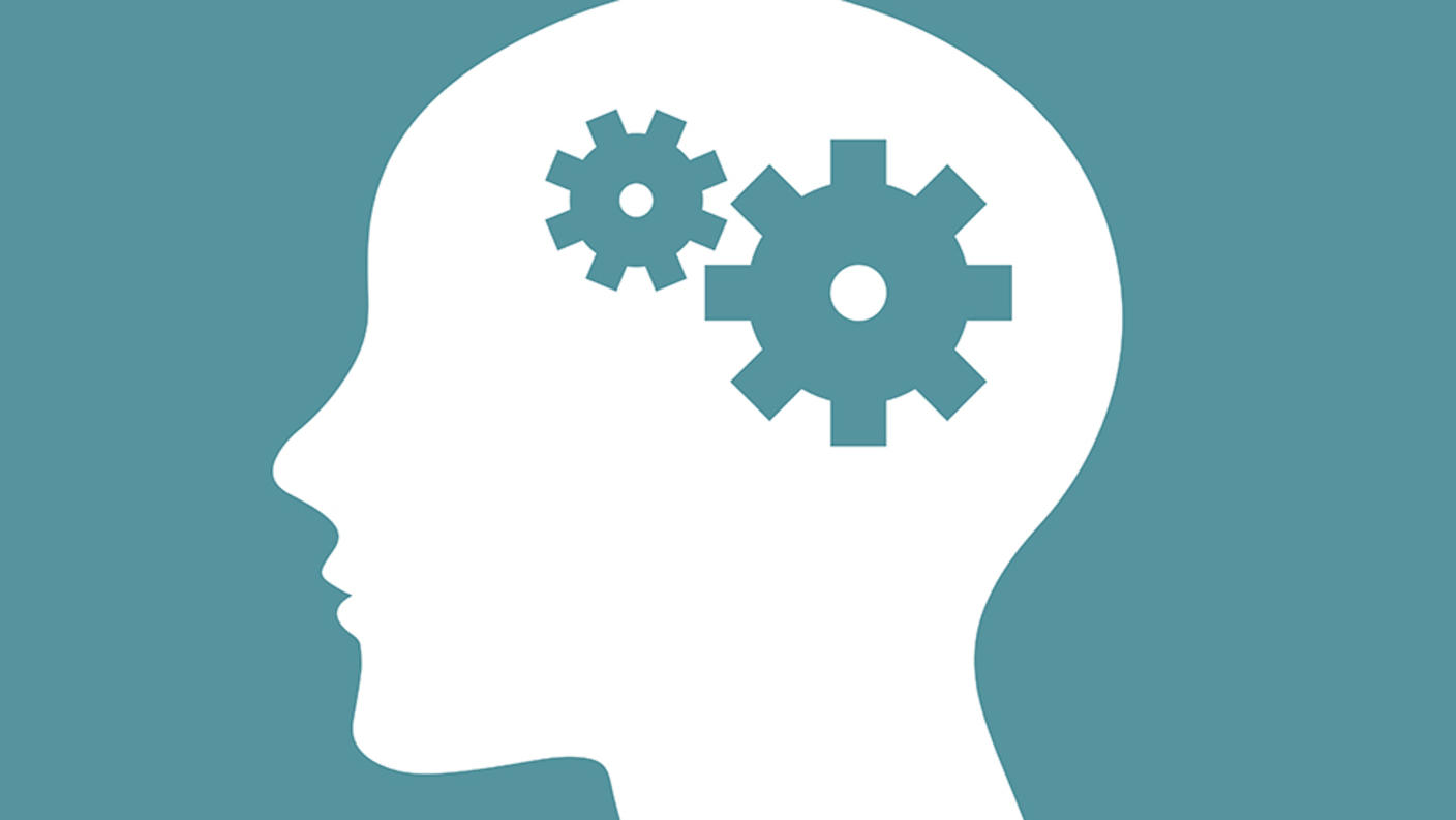 Icon of a person's head with gears inside