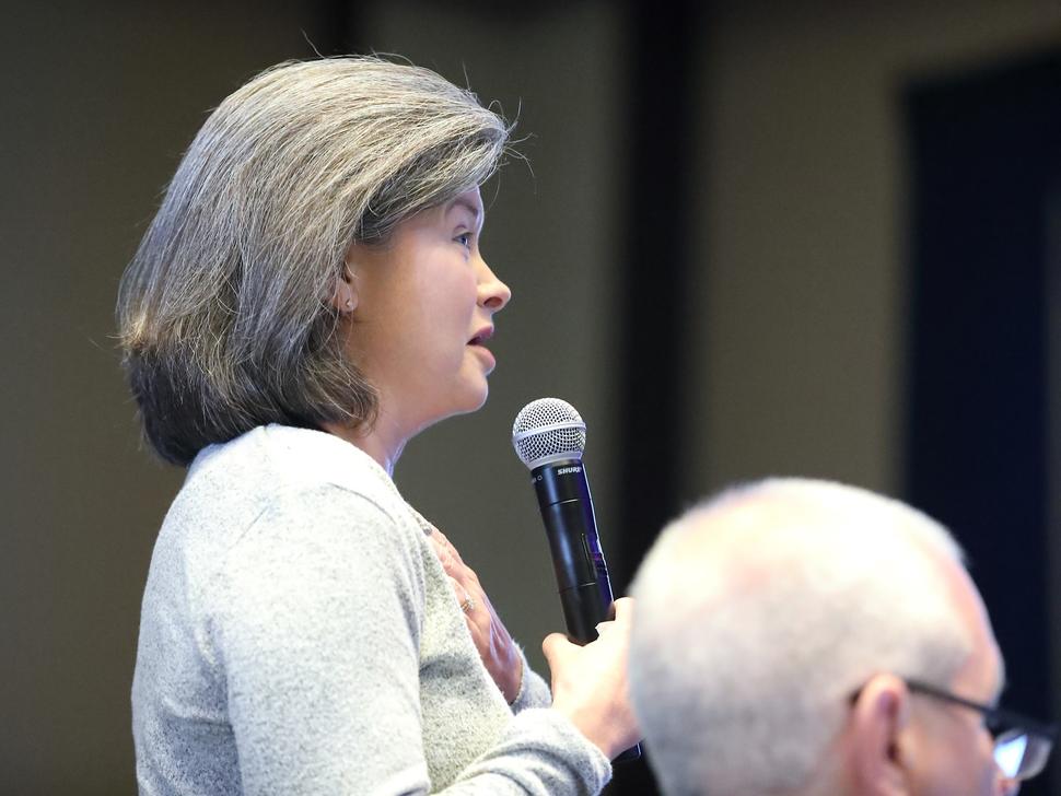 Photo of Amanda Haddock addressing attendees of the CCDI symposium.