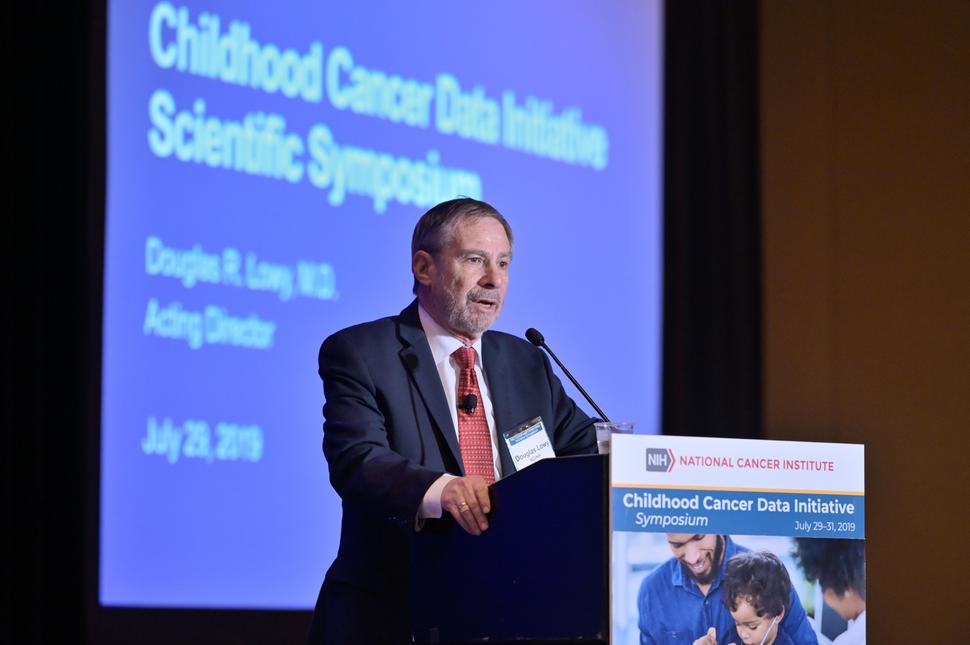 NCI Acting Director Douglas Lowy, M.D., speaking at the Childhood Cancer Data Initiative Symposium in Washington, DC.