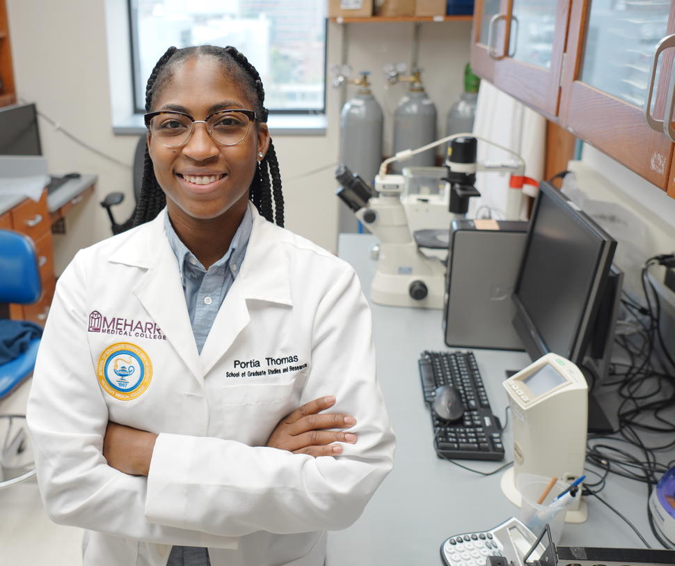 Photo of Dr. Portia Thomas standing in her laboratory