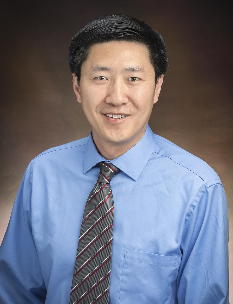 Photo of Dr. Kai Tan