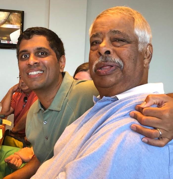 Dr. Satish Gopal and his father embrace