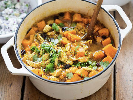 Cover of the booklet, Eating Hints, shows a big pot of vegetable stew with sweet potatoes.