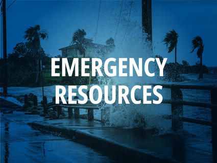 Emergency Resources, in the background a flooded street and stormy weather.