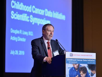 NCI Acting Director Douglas Lowy, M.D., speaking at the Childhood Cancer Data Initiative Symposium in Washington, DC.