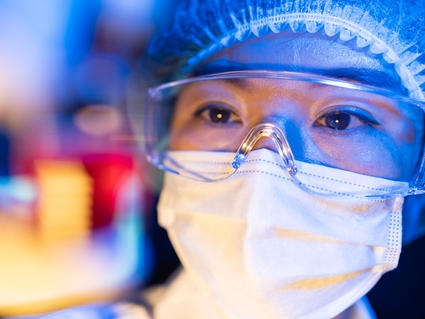 Female scientist working on virus vaccines