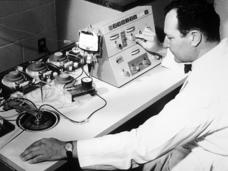 Dr. Emil Freireich working with a blood cell separator
