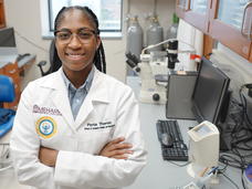Photo of Dr. Portia Thomas standing in her laboratory