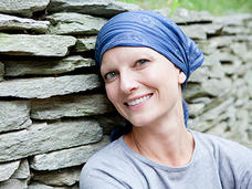 Smiling woman wearing head scarf