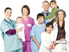 Health professionals smiling with children patients