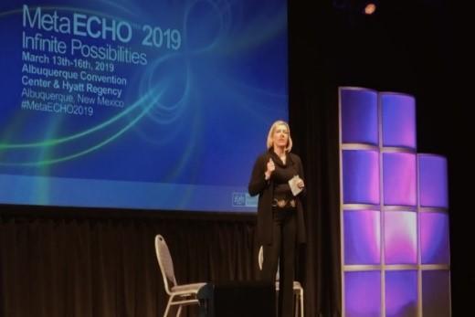 Speaker on stage at MetaEcho 2019.