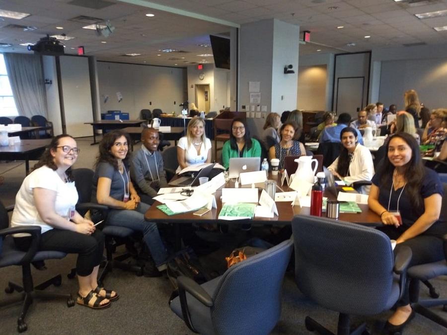 Indoor photo of summer interns.