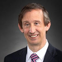 Headshot of John Crispino