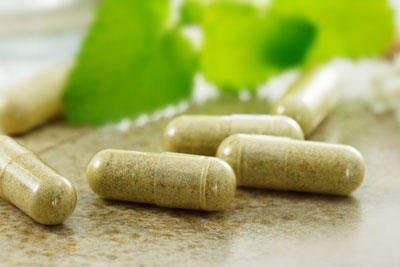 Several capsules containing herbal compounds.