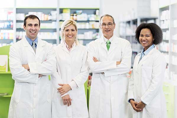 Group of people in lab coats