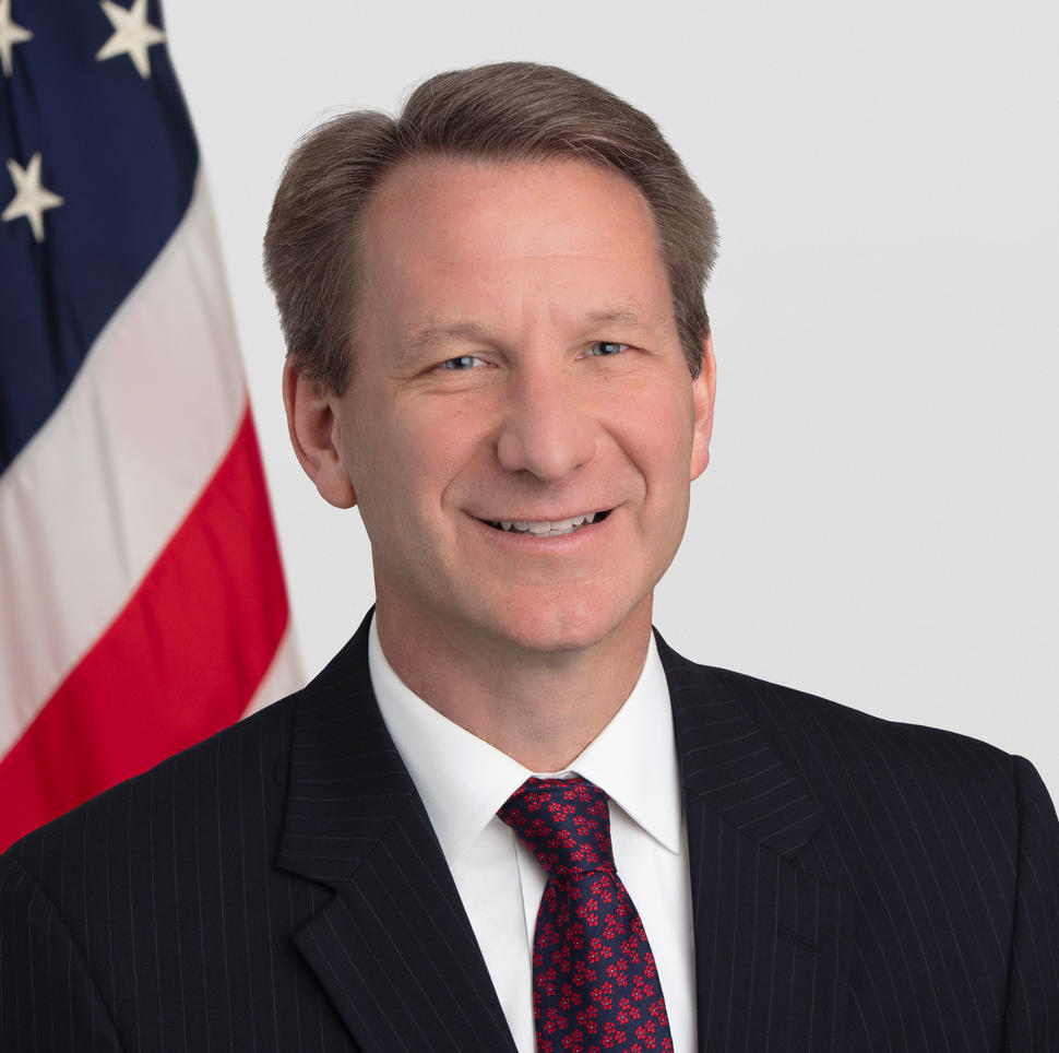 Headshot of Dr. Norman E. Sharpless