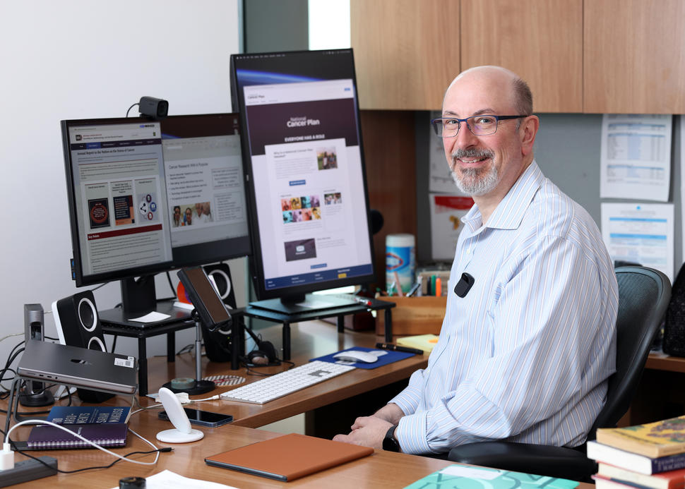 Oliver Bogler sitting at a desk