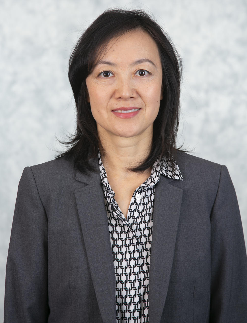 Headshot of Sue Pan.