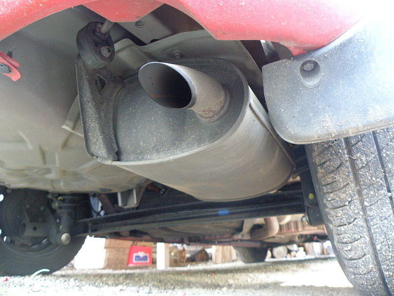 Image of an automobile muffler and tailpipe.