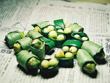 Areca nuts wrapped in betal leaves.
