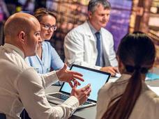 Group of scientists having a meeting