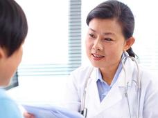 Female doctor talking to a patient.