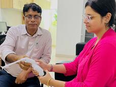 A man and a women training with a thermal ablation device.