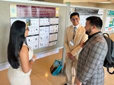Puerto Rico PDW Participants present their research during the poster session.