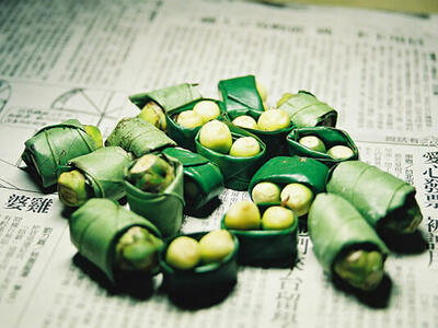 Areca nuts wrapped in betal leaves.