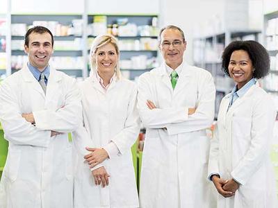 Group of people in lab coats