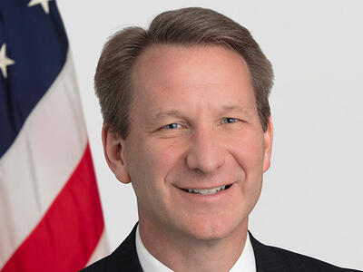 Headshot of Dr. Norman E. Sharpless