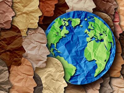 Cut paper collage of faces around a globe