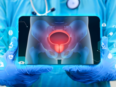 A doctor presents a laptop displaying a prostate image. Small icons around the laptop represent items found in clinical medicine, including a syringe, a microscope, medical scans, a doctor’s bag, and a nurse’s cap. Denotes the idea of bringing technology into clinical practice.
