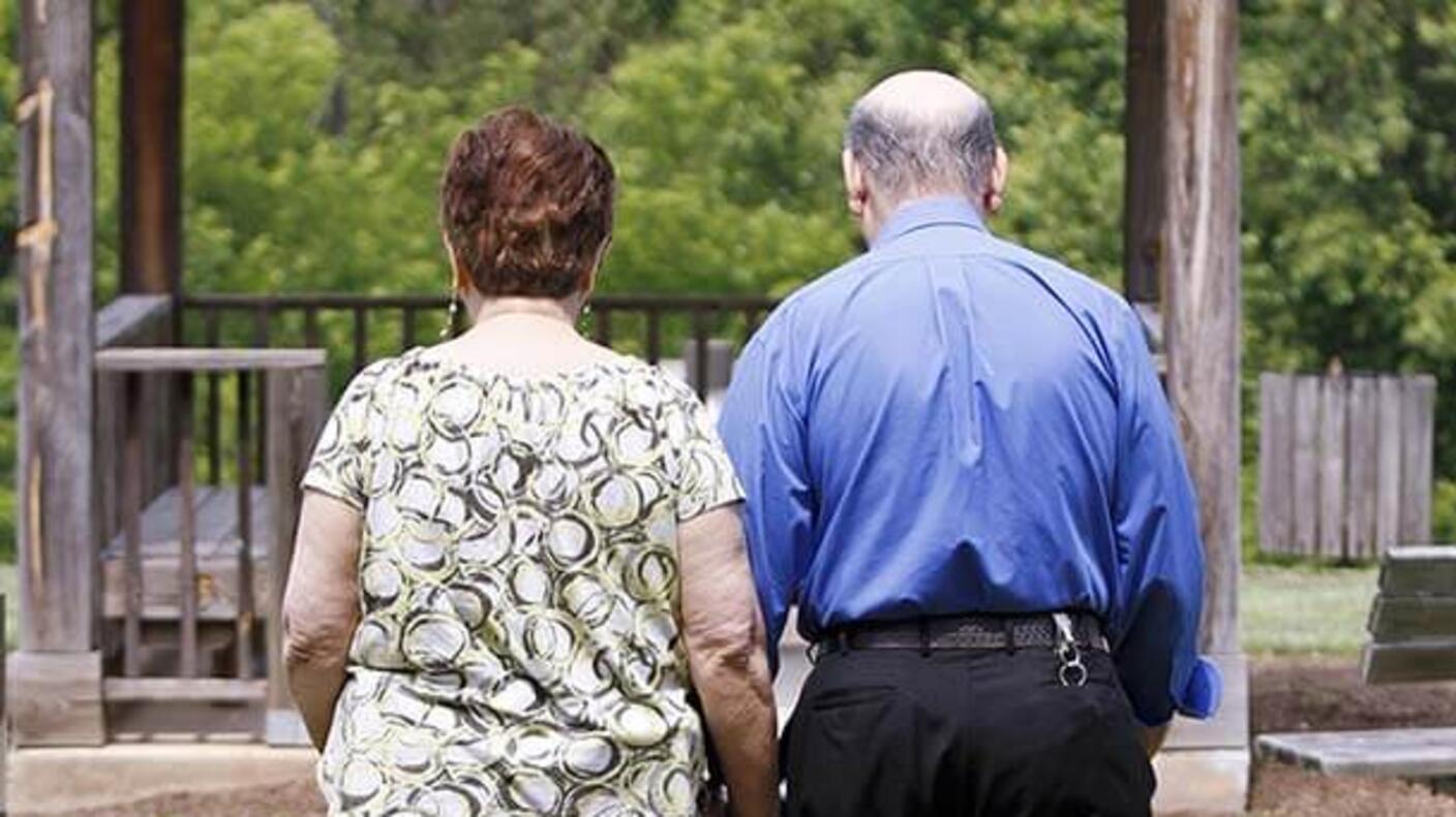 Image of an older couple walking 