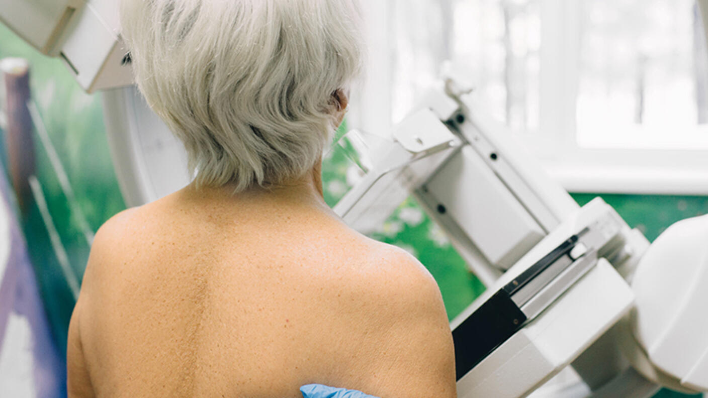 Senior woman having a mammography scan