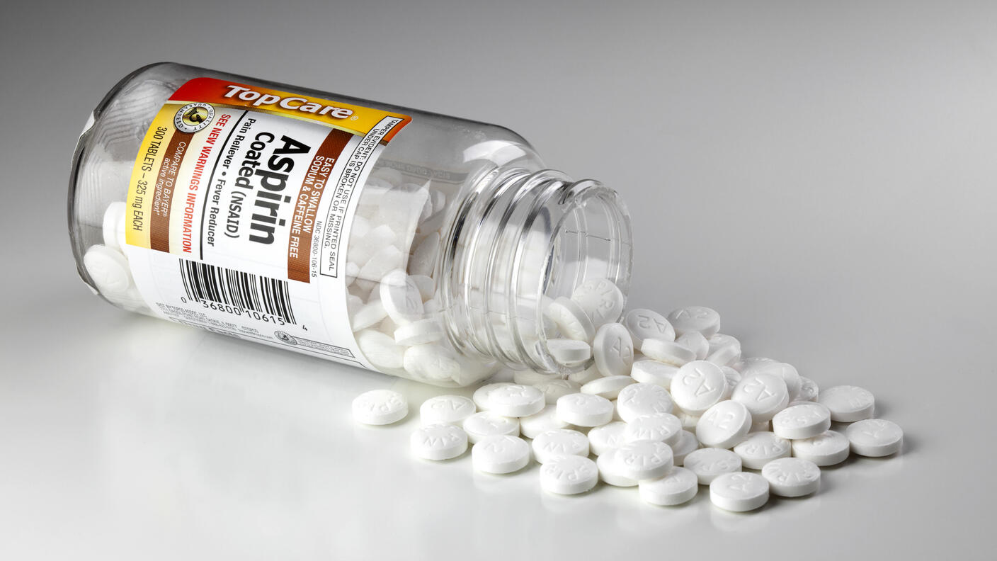 Pills spilling out of bottle 