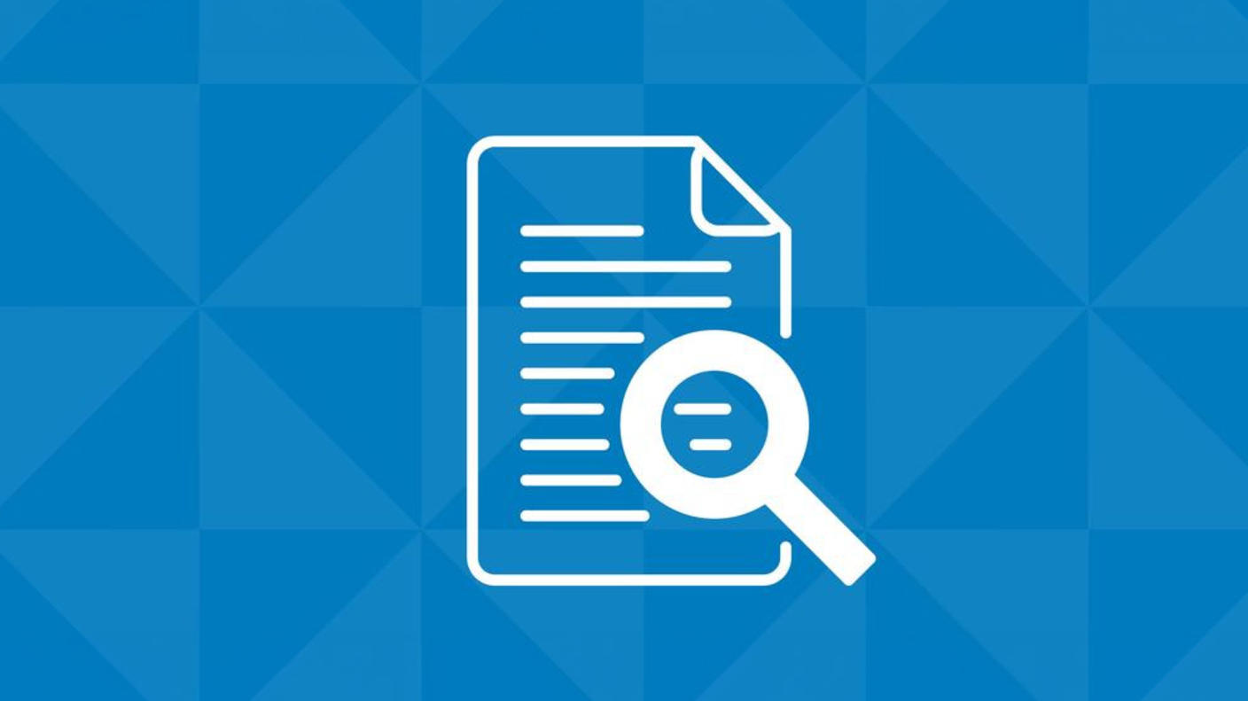 magnifying glass icon on top of a page icon