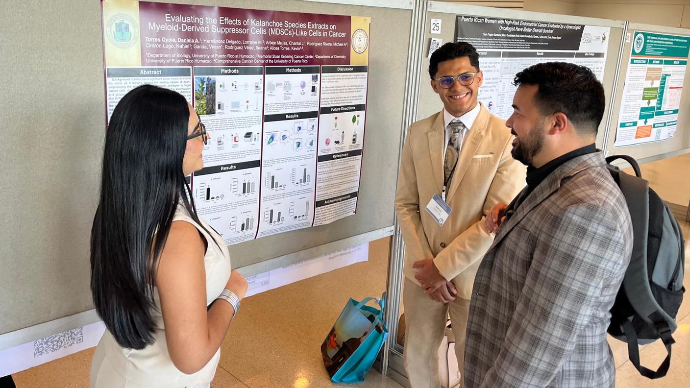 Puerto Rico PDW Participants present their research during the poster session.