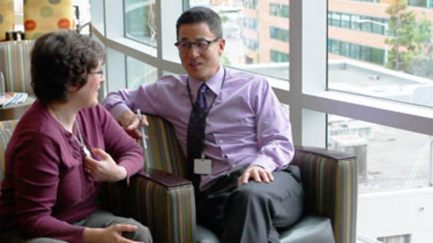 Dr. Anthony Back talking with one of his patients