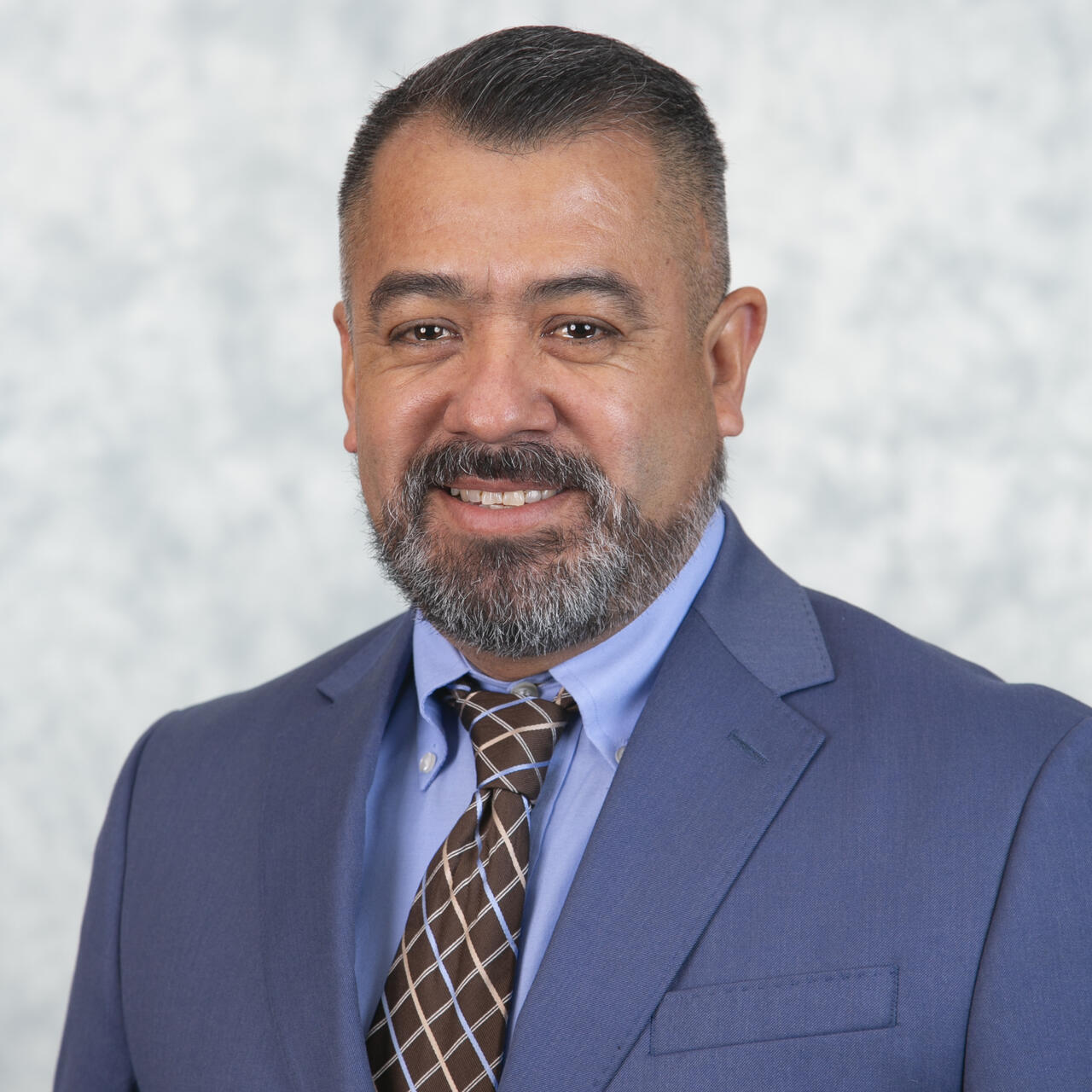 Headshot of Marcos Munoz.