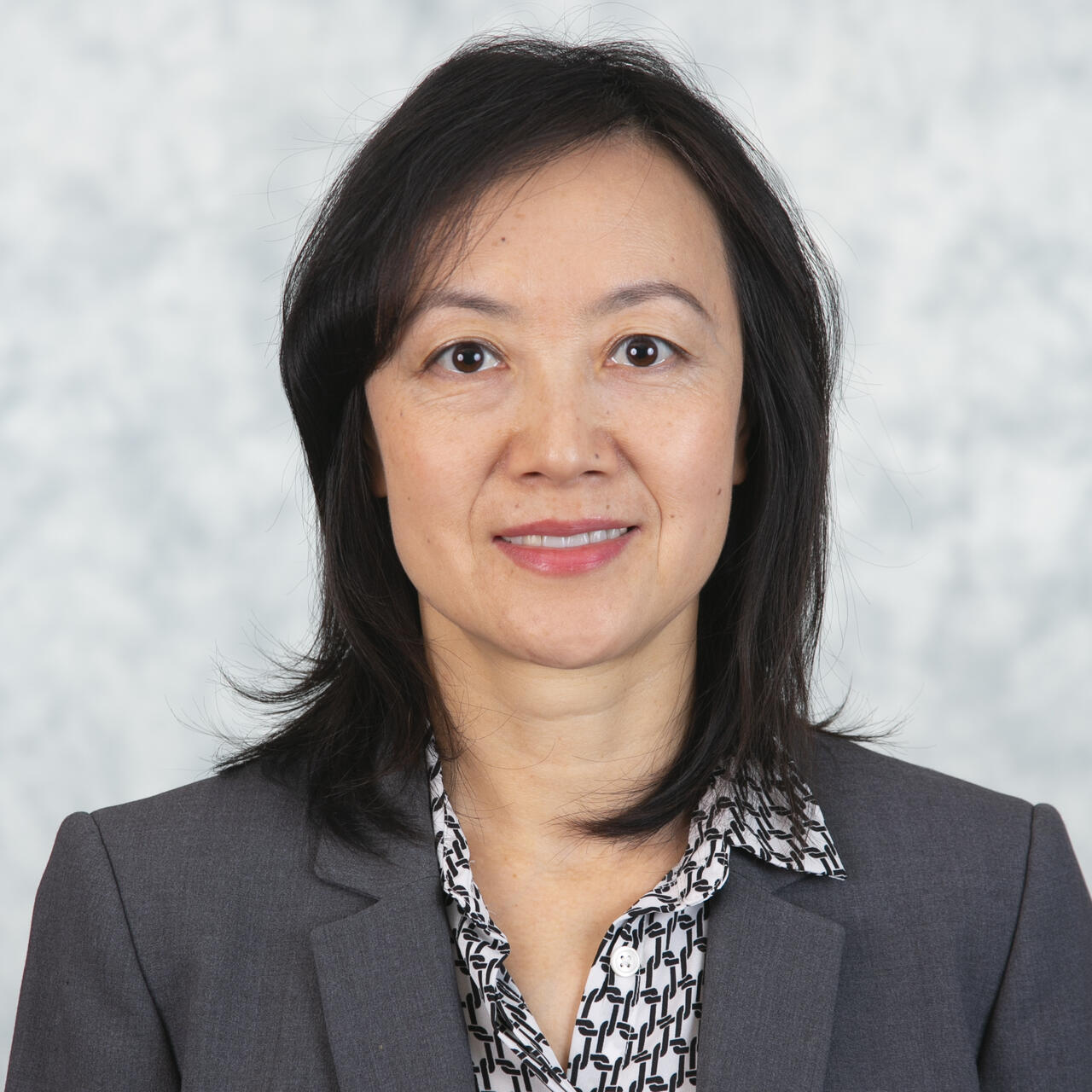 Headshot of Sue Pan.